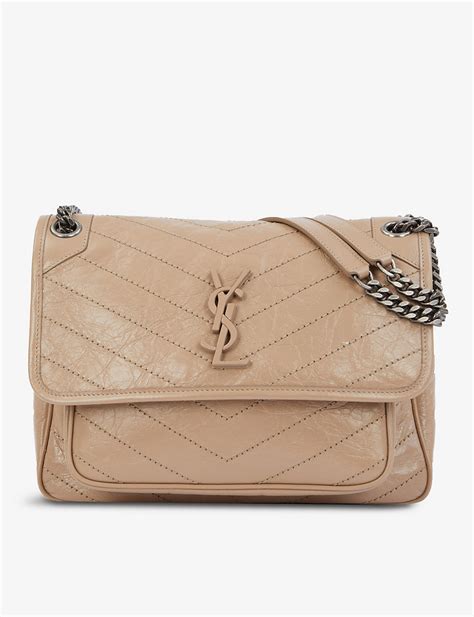 ysl niki gold sand|YSL niki bag.